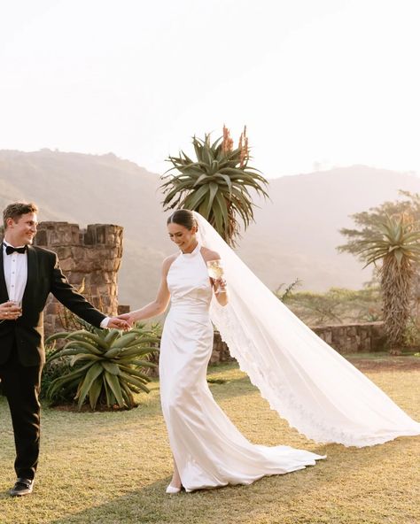 Draped luxury ✨️ How gorgeous are these photos by @skyekyraphotography from a recent styled shoot! This halter neck wedding dress, featuring a hand drapped bodice and skirt, with a low open back and tie detail at the waist. Made from luxurious silky satin, it hangs effortlessly. Perfect for your effortlessly chic aesthetic! Paired with this achrival veil from @veil_atelier and some stunning earrings from @olivecoral. The ever so talented @kiss.the.bride.hair.makeup did this absolutely fl... Halter Wedding Dress With Veil, Halter Neck Wedding Dress With Keyhole Back, Halter Neck Wedding Dress With Veil, Luxury Halter Neck Wedding Dress, Chic Halter Neck Sleeveless Wedding Dress, Flirty Halter Neck Wedding Dress, Halter Neck Wedding Dress, Halter Wedding Dress, Wedding Dress With Veil