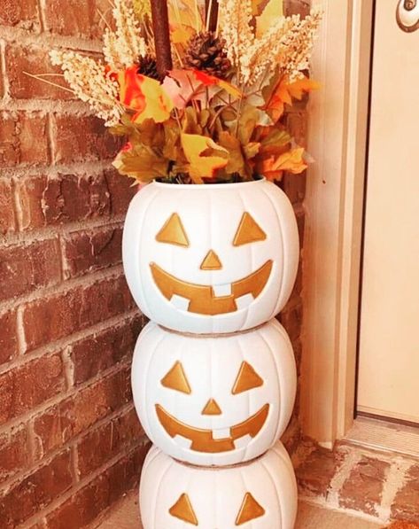 Halloween Decor Idea! Spray paint three plastic pumpkin buckets and stack (glue together or double sided tape). Add some cute floral decor on top! #halloween #halloweendecor #falldecor #explore #explorepage #diy #crafts Pumpkin Stacked Decor, Plastic Pumpkin Bucket Crafts, Pumpkin Pail Decor, Pumpkin Pail Crafts, Plastic Pumpkin Decorating Ideas, Diy Stacked Pumpkins, Pumpkin Bucket Decor, Plastic Pumpkins Makeover, Pumpkin Bucket Crafts