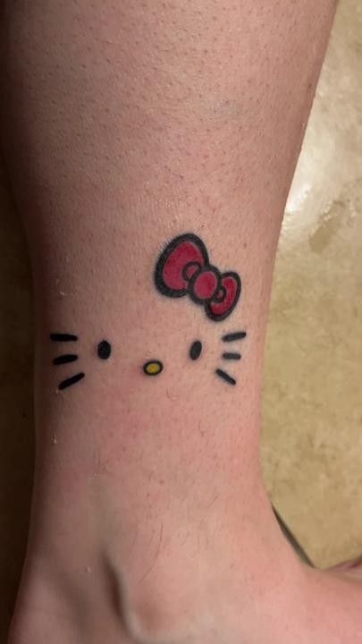 Hello Kitty Small Tattoo, Hello Kitty Tattoo Ideas Design, Hello Kitty Thigh Tattoo, Hello Kitty Face Tattoo, Hello Kitty Henna, Hello Kitty Bow Tattoo, Small Hello Kitty Tattoo, Hello Kitty Tattoo Design, Tattoo Ideas Black Women