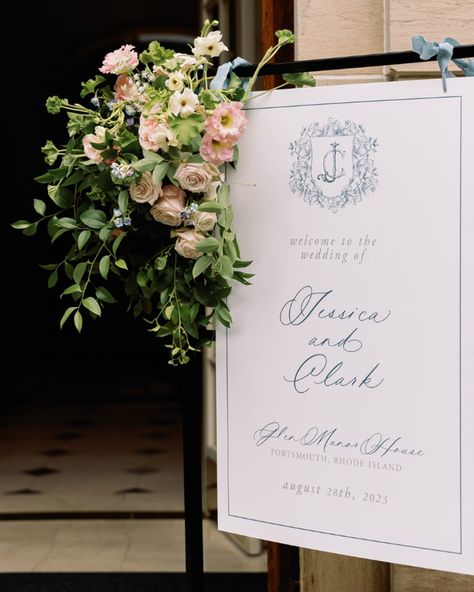 The most stunning acrylic welcome sign for J & C's Rhode Island destination wedding ✨  24x36 White Gloss Acrylic with UV printing, hung on our black metal sign stand from the Rental Collection!  Fine Art Stationery, Luxury Wedding Stationery, Wedding Sign, Day-Of Stationery, Fine Art Weddings, Editorial Weddings  --  Photography: @henryandmac Event Planning & Design: @courtneyelizabethevents Stationery & Signage: @letterlandstudio Floral Design: @botanicawedding Venue: @glenmanorhouse Luxury Wedding Welcome Sign, Welcome Sign Stand, Wedding Crest Monogram, English Winter, Acrylic Welcome Sign, Reception Signage, Crest Monogram, Welcome Sign Wedding, Wedding Crest