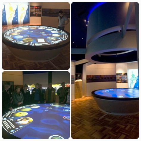 Custom Round Multitouch Table for ZedBuffer in Australia - 12 Guests Can Interact At Once. Commissioned by Sydney Catchment Authority for the Warragamba Dam visitor exhibition titled ‘Water for Life’. The table displays 40 individual stories in four thematic groups – Water, Catchments, Dam, and People. #exhibitdesign #multitouchtables #interactive #gesturecontrol Ceo Cabin, Multitouch Table, Interactive Projection, Trade Show Exhibit, Touch Table, Tech Savvy, Table Display, Work Table, Digital Signage