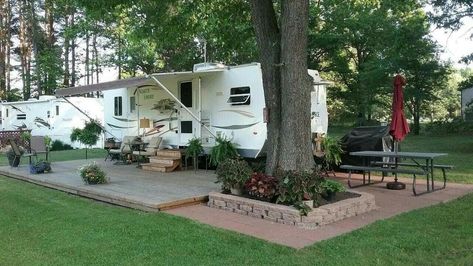 Backyard Camper Retreat, Trailer Patio Ideas Outdoor Spaces, Permanent Camper Site Ideas Camping, Rv Lot Landscaping Ideas Patio, Permanent Camper Site Ideas Patio, Campsite Landscaping Ideas, Rv Landscaping Ideas, Rv Site Setup Ideas, Seasonal Camping Sites Ideas