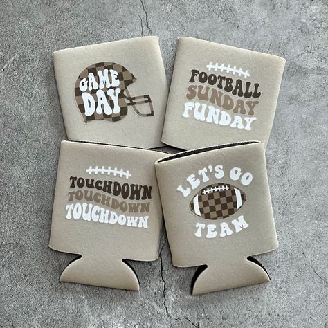 The perfect can coolers for game day! Fits standard 12oz cans. Comes with an assortment of designs per order, unless ordering a set of 3 or less pieces. In that event, please feel free to leave a note with your choice of design(s.) Can Coolers With Cricut, College Cricut Ideas, Koozie Cricut Ideas, Football Koozie Ideas, Cricket Projects To Sell, Football Crafts To Sell, Koozie Design Ideas, Cricut Projects For Gifts, Summer Cricut Projects To Sell