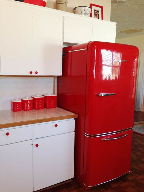 Elizabeth's red and white kitchen and laundry room - divine! Red Vintage Refrigerator, Garcia House, Grey Tile Kitchen Floor, Red Fridge, Red Mercedes, Cowboy Wallpaper, Red Refrigerator, Kitchen And Laundry Room, Retro Kitchen Appliances