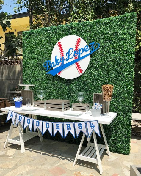 Dodger Baby Shower! Backdrop, base ball sign and table by @bizziebeecreations table decor provided by our client and display by @bizziebeecreations. Wood sign cut by @wolfelaserengraving and banner It’s to hot to put out the desserts and candy. #babyshower #backdrop #dodgers #dodgerbabyshower #catchmyparty #partytime #eventstylist #bizziebeecreations #partydecor #baseballbabyshower #baseballparty #decor #props #events #partyplanner #partyideas #partystyling #eventstylist #eventdecor #party #... Dodgers Birthday Party, Dodger Party, Dodgers Party, Office Baby Showers, Baseball Theme Birthday, Baseball Baby Shower Theme, Sports Baby Shower, Baby Shower Dessert Table, Baseball Theme Party