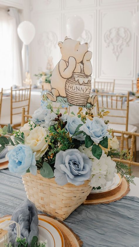 Luxury Party Planning•Event Styling •Balloon Decor | Winnie the Pooh This was such a dreamy classic Winnie the Pooh tablescape. The dusty blues with soft yellows were the perfect tones to… | Instagram Winnie The Pooh Table Settings, Winnie The Pooh Baby Shower Table Set Up, Classic Winnie The Pooh Gender Reveal, Winnie The Pooh Balloon Centerpieces, Blue Winnie The Pooh Baby Shower Ideas, Winnie Pooh Centerpieces, Winnie The Pooh Baby Shower Table Decor, Winnie The Pooh Floral Centerpieces, Winnie The Pooh Table Decorations