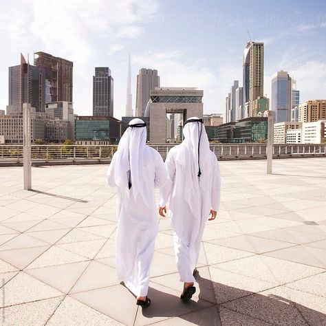 Traditional dressed Arab businessmen. Dubai. U.A.E by Hugh Sitton - Stocksy United #stockphoto #stock #diversity #business Dubai People, Dubai Culture, Professional Casual Outfit, Own Clothing Brand, Lakme Fashion Week 2015, Business Dress Code, Strong Woman Tattoos, Manish Fashion, Studio Layout