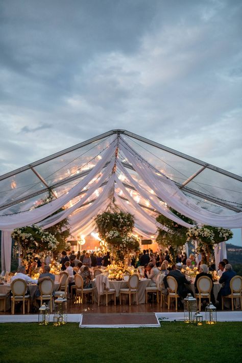 Clear wedding tent for reception decorated with white draping, fairy-lights and greenery | Charming wedding on the Cote d'Azur with the most jaw dropping florals | Cannes Real Weddings | Photography: CEDRIC KLEIN | Magnolia Rouge: Fine Art Wedding Blog Wedding Cabana, Fairy Lights Wedding Reception Outdoor, Fairy Lights Tent Wedding, Clear Tent Wedding Reception Night, Clear Roof Tent Wedding, Boho Wedding Tent, Clear Wedding Tent, Clear Tent Wedding Reception, Clear Top Tent Wedding