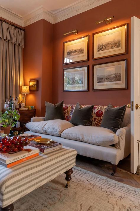 A beautiful sitting room painted in warm terracotta Red Living Room Walls, Siting Room, Terracotta Living Room, Cozy Sitting Room, Snug Room, Room Wall Colors, Luxury Bedroom Design, Living Room Decor Fireplace, Living Room Red