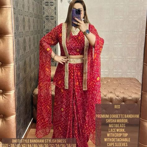 *DISPATCHING DATE - 30th July* ✅ *PLUSSIZE PREMIUM BRAND❤️* *DHOTI STYLE BANDHANI STYLISH DRESS* ❤️ *PREMIUM BANDHANI GEORGETTE*✅ *SHISHA MIRROR,MOTIBEADS LACE WORK*✅ *CROP TOP WITH DETACHABLE JACKET CAPE SLEEVES* ✅ *DHOTI STYLE COWL SKIRT* ✅ *SIZE - 38/40/42/44/46/48/50/52/54/56/58/60* ✅ *LENGTH - 57* ✅ Code sfsnoba+ *QUALITY ASSURED* 👍🏻 *BOOK YOUR ORDER FAST* To order whats app on 9082560125 #Amoolya #shortdress #salwarsuits #onepiece #green #gowncollection #readytowear #teenagers ... Skirt Dhoti Style, Bandhani Skirt With Top, Bandhani Dress Pattern, Cowl Skirt, Bandhani Lehenga, Detachable Jacket, Bandhani Dress, Jacket Cape, Bandhani Saree