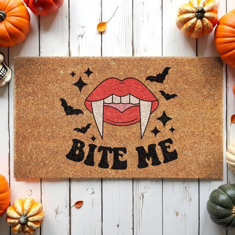 Happy Halloween, Bite Me, Coir Door Mat, Welcome Mat, Front Door Mat, Outdoor Mats, Bite Me, Doormat Fall Mats Halloween Decor Mats, Bite Me Welcome to our store! Our doormat is made with high-quality natural coir with backs that are made with slip-resistant PVC rubber backing. All mats are printed with UV-resistant ink so that they last long under all weather conditions. Our doormat is the perfect long-lasting gift for your loved ones. Made from 100% coir, this rectangular doormat helps keep your space clean, while the backing material helps prevent it from slipping or sliding. Our doormat is made of 0.5in thick coconut coir fiber, the material easily captures moisture, dirt, and other particles, to trap the bristles of absorbent coconut shell fiber in the dirt, so you can wipe your feet Halloween Door Mat Painting, Halloween Door Mats Diy, Diy Halloween Mat, Front Door Mat Outdoor, Welcome Mat Front Door, Halloween Bites, Halloween Diy Door, Halloween Mats, Mat Front Door