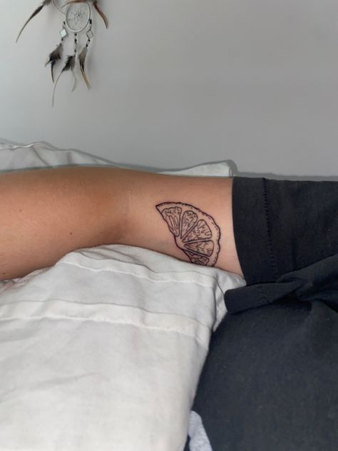 Orange slice tattoo. Lemon wedge tattoo Like Wedge Tattoo, Sliced Fruit Tattoo, Orange Outline Tattoo, Orange Slice Tattoo Traditional, Lemon Slice Tattoo Minimalist, Orange Wedge Tattoo, Orange Slice Tattoo Black And White, Citrus Slice Tattoo, Fruit Slice Tattoo