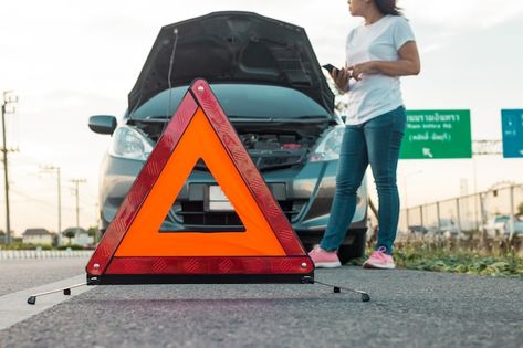 Premium Photo | Broken down car on the road Broken City, Car Breaks, Towing Service, Stop Sign, Jaguar Xj, Roadside Assistance, City Car, Flat Tire, Tow Truck