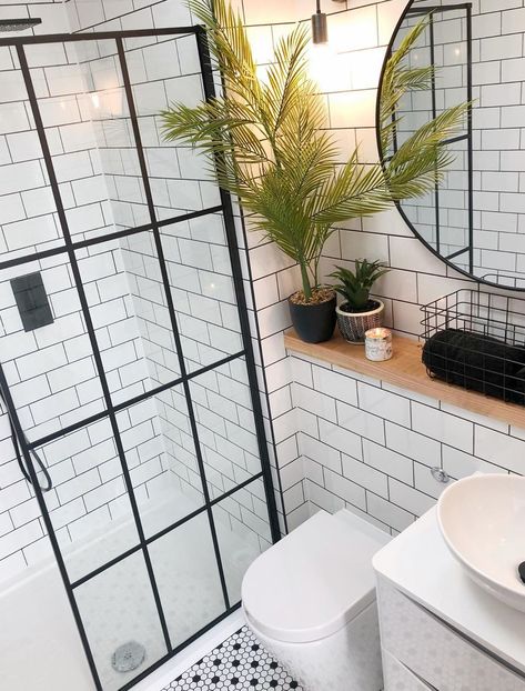 This is such a modern bathroom with the crittall style shower screen, the penny tiles on the floor and the metro tiles on the wall. The industrial style mirror works so well here too. Shower room in the home of  inside_the_white_house on Instagram. Modern Shower Room, Home By The Sea, Small Shower Room, Ensuite Shower Room, Seaside Home, Small Bathroom With Shower, Small Bathroom Interior, Loft Bathroom, Loft Ideas