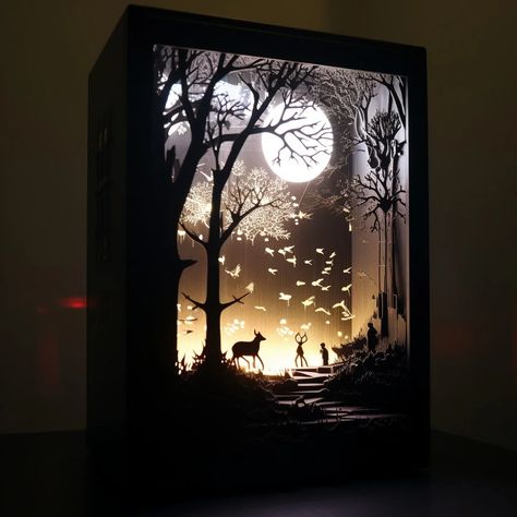 30 Creative Shadow Box Ideas to Turn Keepsakes into Art Lit Shadow Box Ideas, Diy Christmas Shadow Boxes With Lights, Creepy Shadow Box Ideas, Light Up Diorama, Ikea Shadow Box Ideas, Light Shadow Box Ideas, Framed 3d Art, Shadow Box Painting Ideas, Shadow Box Ideas For Christmas