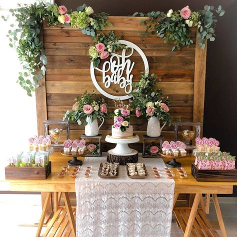 CafeMom.com : Pink Floral Decor : 22 Bohemian Baby Shower Ideas for Free-Spirited Mamas -- This dessert table is full of pink flowers. There are flowers in vases, on the wooden backdrop, and on the cake. It's perfectly coordinated. And we love the "oh baby" sign above the cake. Bohemian Baby Shower Ideas, Pink Floral Decor, Girl Shower Themes, Idee Babyshower, Bohemian Baby Shower, Creative Baby Shower, Chic Baby Shower, Bohemian Baby