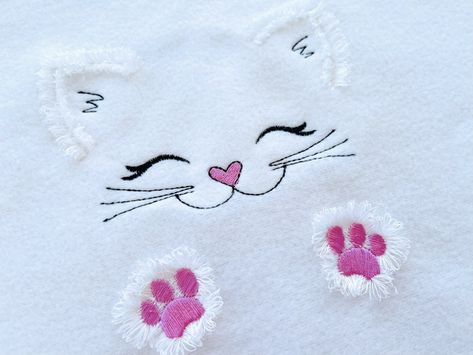 Fringe fluffy paws Kitten cat fringed fur machine embroidery designs kitty baby kids Fringe chenille little cat small sizes 4, 5, 6 inchesSizes4 inches4.5 inches5 inches6 inches100 % safe to wash.The design has a special seam holding fringe in place.It is easy. Embroider the design as usually appli Kids Fringe, Kitty Embroidery, Cat Machines, Cat Applique, Digital Embroidery Patterns, Kitty Baby, Little Cat, Hand Embroidery Pattern, Flower Embroidery Designs