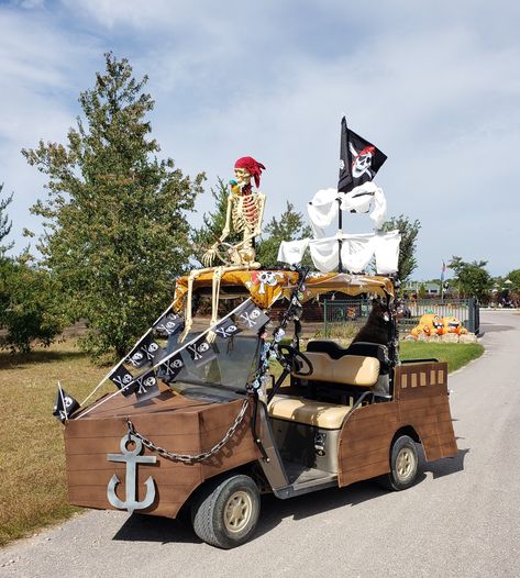 Turn your golf cart into a Pirate Ship Pirate Theme Golf Cart, Peter Pan Golf Cart, Golf Cart Decorated Like A Pirate Ship, Pirate Ship Golf Cart, Diy Pirate Ship Golf Cart, Golf Cart Theme Ideas, Decorating Golf Cart, Golf Cart Pirate Ship, Homecoming Golf Cart Ideas