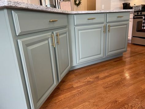 Benjamin Moore's Carolina Gull is one of our most versatile colors, looking beauitful yet different in all sorts of lighting. This island makes a bold yet impressive impact on this lovely kitchen! Carolina Gull Cabinets, Carolina Gull Benjamin Moore Kitchens, Carolina Gull Benjamin Moore, Benjamin Moore Carolina Gull, Carolina Gull, Moore Kitchen, Benjamin Moore Kitchen, Cabinets Colors, Ski Mask The Slump