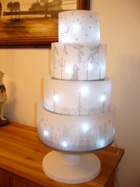 Yes, this is a real cake, four tiers with Moonlight Garden decoration. Wedding cake with lights Wedding Cake Fairy Lights, Wedding Cake With Lights, Cake With Lights, Light Up Cake, Moonlight Garden, Light Cakes, Themed Wedding Cakes, Awesome Cakes, White Cake