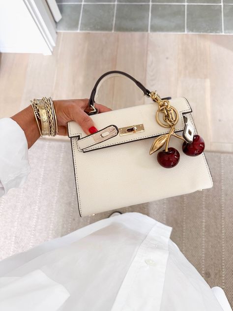 Shop Cherry Bag Charm and other curated products on LTK, the easiest way to shop everything from your favourite creators. Tote Bag Charms, Cherry Bag, Cherry Charm, Neutral Accessories, Bag Charms, Jewelry Box, Cherry, Charms, Tote Bag