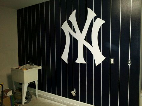 NY Yankees logo on garage wall Yankee Bedroom, Baseball Bathroom, Ny Yankees Logo, Baseball Themed Bedroom, Baseball Project, Man Cave Bathroom, Baseball Bedroom, Boys Bedroom Furniture, Baseball Room