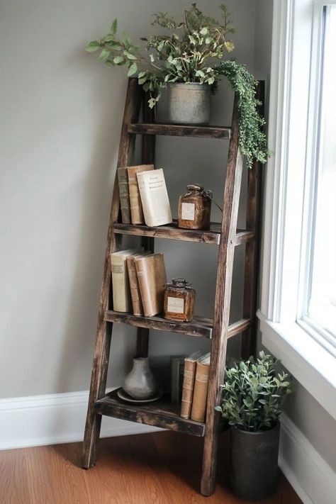 "Add a touch of rustic elegance to your home with a DIY Vintage Ladder Shelf! 🛠️🪜 Perfect for creating a stylish and practical storage solution. 🌟✨ #VintageLadder #DIYProjects #HomeDecor" Old Wooden Ladder Ideas, Ladder Decor Living Room, Decorative Ladder Ideas, Ladder Bookshelf Decor, Vintage Ladder Decor, Wooden Ladder Ideas, Wood Ladder Decor, Old Wood Ladder, Rustic Ladder Shelf