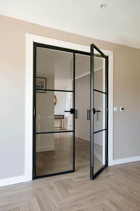 Hallway With Glass Doors, Black Glass Lounge Doors, Black Crittall Doors, Double Crittal Doors Internal, Steel Glass Doors Office, Modern Double Doors Interior, Black Steel Glass Doors, Glass Steel Doors, Black Frame Double Doors