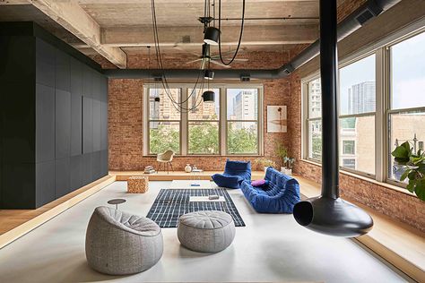 An Old Chicago Factory Loft Is Transformed Into a Homebody's Dream Living Room Zones, Industrial Room, Light Wooden Floor, New Staircase, Cosy Living Room, Sleeping Loft, Exposed Brick Walls, 아파트 인테리어, Apartment Life