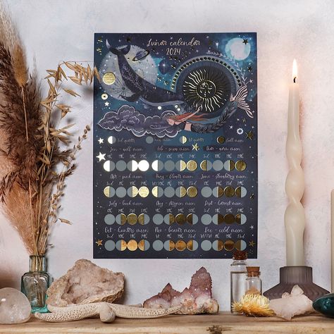 This lunar calendar has a celestial mermaid vibe with gold foiled details on the full and quarter moons. Mermaid And Whale, Celestial Calendar, Celestial Mermaid, Moon Names, Moon Phase Calendar, Strawberry Moons, Lunar Calendar, Lunar Cycle, Wolf Moon