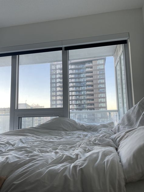 white bed in front of a large window overlooking Toronto skyline Apartment, Photo And Video, Instagram Photos, Instagram Photo, Instagram