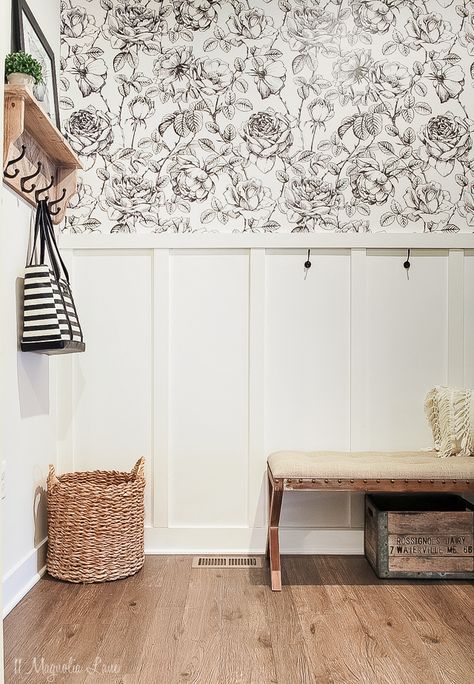 Love this fun black and white floral print, perfect in a mudroom! It was easy to install this wall mural. Graphic Wallpaper For Home, Cool Wall Treatments, Entryway With Paneling, Mudroom With Wallpaper, Wall Panelling With Wallpaper, Mud Room Wallpaper, Wallpaper Mudroom, Wallpapered Accent Wall, Wallpaper On One Wall