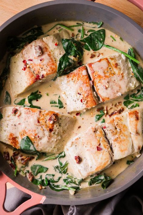 This easy pan fried paleo mahi mahi recipe is served coated in the most amazing creamy sun dried tomato sauce, and it's ready in just 20 minutes! The result is a healthy and comforting weeknight dinner for the whole family. #paleo #whole30 #keto #lowcarb #30minutedinner #quickandeasywhole30 #30minutewhole30meals Creamy Sun Dried Tomato Sauce, Mahi Mahi Recipe, Mahi Mahi Recipes, Paleo Fish Recipes, Paleo Fish, Sun Dried Tomato Sauce, Whole30 Keto, Paleo Food, Sundried Tomato