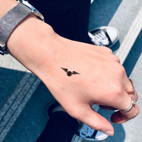 Tiny Golden Snitch Tattoo, Tiny Harry Potter Tattoos, Golden Snitch Tattoo, Snitch Tattoo, Harry Tattoos, Make Up Remover, Hp Tattoo, Tattoo Sticker, Golden Snitch