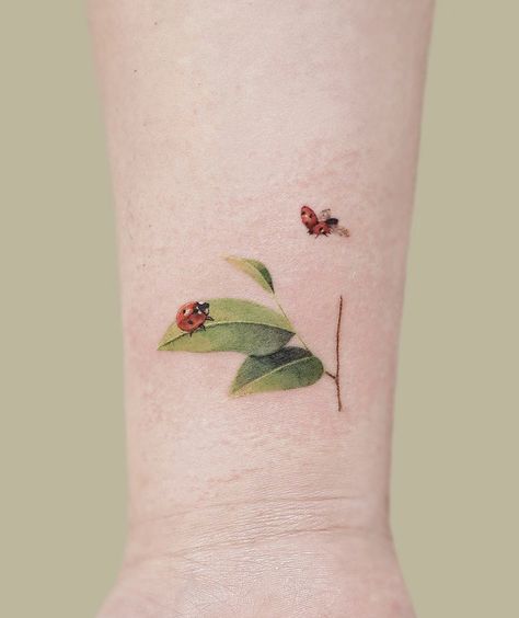 Ladybug On A Leaf Tattoo, Ladybug And Bee Tattoo, Flying Ladybug Tattoo, Ladybug And Flower Tattoo, Tiny Snail Tattoo, Fine Line Ladybug Tattoo, Lady Bird Tattoo, Dainty Ladybug Tattoo, Ladybug Tattoo Ideas