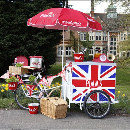 Allow your party to indulge in themed event beverages at their finest with our fabulous Mobile Pimm's Tricycle, the ideal event catering solution for your bespoke event and customised entertainment in the UK.   Classic Pimm’s has to be the most celebrated alcoholic beverage in the UK, so what better way to mark your special occasion than to hire our delightful Mobile Pimm’s Tricycle? Brighton Themed Party, Pimms Wedding, Best Of British Theme, British Party Decorations, British Street Party, Pimms Bar, Mobile Bars, Cycling Events, Bike Cart