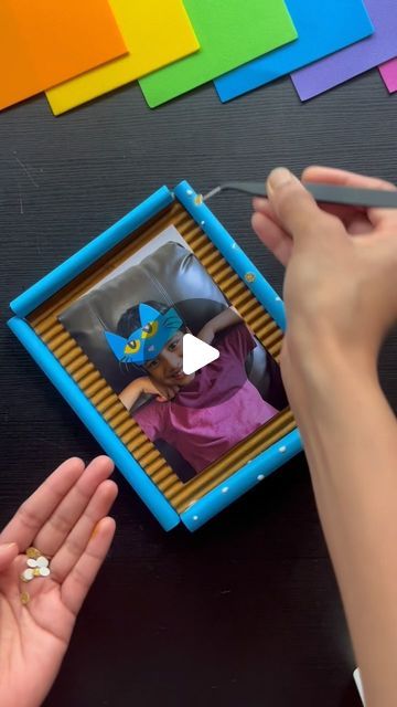 CraftISH corner on Instagram: "DIY Picture Frame Idea for Kids! 🖼️ 

Looking for a cool summer project before school starts? This DIY picture frame is perfect! It’s a great way to create memories and could be a fantastic desktop decor for anyone in the family.✨

Follow for more @craftishcorner 

Youtube link in bio ⬆️ 
.
.
.
.
.
#diyframe #diypictureframe #diyphotoframe #cardboard #cardboardframe #cardboardcrafts #papercrafts #paperdecor #homedecorideas #deskdecor #tabledecor #tabledecorideas #tabletopframe #wallframediy #walldecorideas #photodiy #pictureframeidea #desktopdecor #deskdecordiy #deskdecor #deskdecorideas" Easy Diy Photo Frames, Diy Frame Ideas, Wall Frames Diy, Cadre Photo Diy, Cardboard Picture Frames, Kids Art Space, Diy Picture Frame, Photo Frame Crafts, Before School Starts