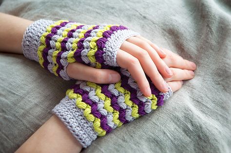 I love these mittens; just one may need on cold winter mornings! They are bright, they are beautiful and they work up quickly. The Neon Love Mitts by Meghan Fernandez, is a fun mitts pattern that uses double and treble crochet. A knitter may say that this crochet stitch pattern almost looks like jumbo sized … Diy Fingerless Gloves, Crochet Mitts, Neon Love, Fingerless Gloves Crochet Pattern, Crochet Gloves Pattern, Animal Knitting Patterns, Gloves Pattern, Fingerless Mitts, Crochet Fingerless Gloves