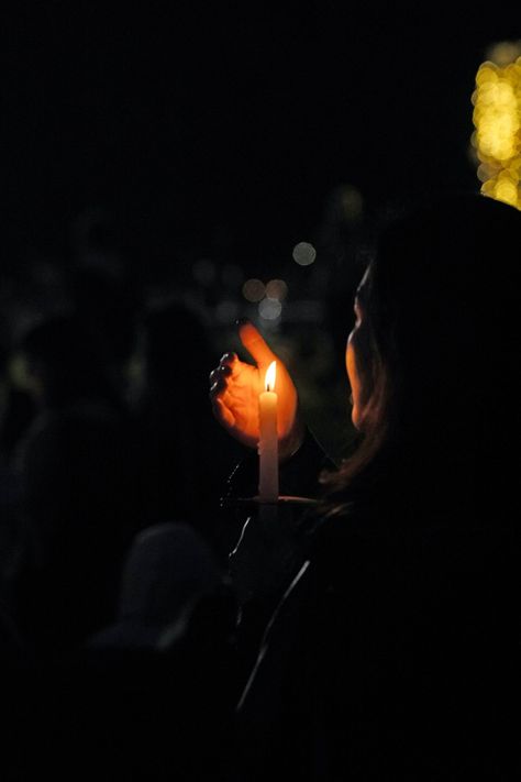 woman holding lit candle photo – Free Candle Image on Unsplash