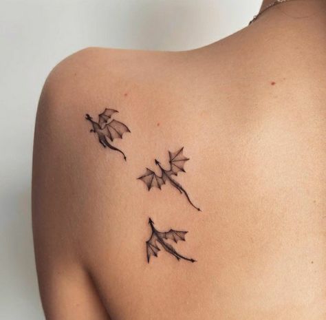 Mini Dragon Tattoo Design, Small Dragon Tattoo Placement, Dragon Tattoo For Women Collar Bone, Dragon Tattoo For Women Ribcage, Dragon Prince Tattoo Ideas, Dragons Tattoo For Women, 3 Small Dragon Tattoos, Tiny Dragon Tattoo For Women, Flying Dragons Tattoo