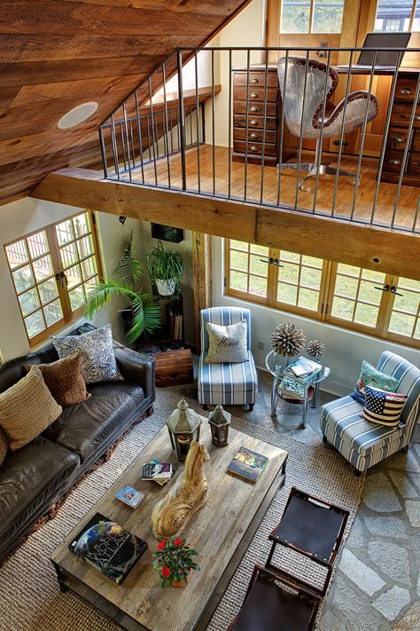 Great room living area with loft office area above in the Tuxedo Park Residence Open Loft Living Room, Loft Above Bedroom, Lofted Office Space, Living Room With Loft Above, Loft Layout Ideas, Cabin Loft Office, Small Loft Kitchen, Office In Loft Area, Loft Addition Ideas