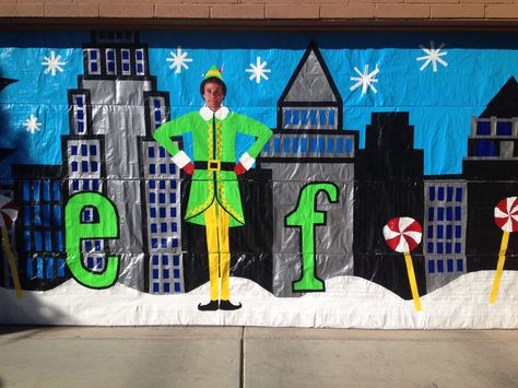 Elf the movie, made out of duct tape. On our garage door. Elf The Movie Office Decorating Ideas, Elf Movie Parade Float Ideas, Elf Movie Parade Float, Elf Float Parade, The Movie Elf Decorations, Buddy The Elf Parade Float Ideas, Elf Movie Hallway Decorations School, Buddy The Elf Trunk Or Treat, Christmas Theme Cubicle Ideas