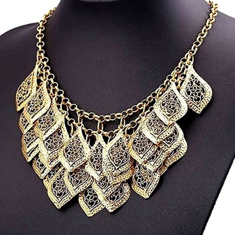 Gold Shiny Bib Necklace For Girl Bohemian Coin Statement Necklace & Earrings Punk Ethnic Jewelry Indian Necklace Bold Collar Necklace Bold Boho Look! This Necklace Though Substantial Surprisingly Is Lightweight When Wearing. Yet Because Of Its Size You Feel Like Your Strapping On Your Armor And Are Ready For Battle, Its Super Empowering! This Is My Favorite Instant Confidence Piece. I Like To Wear It With Just Jeans And A White Tee; It Really Stands Out. I Have It In A Few Colors I Must Admit. Be Ready For Compliments For Sure! Size: (Adjustable):The Length Is 16.53 Inches; Height: 6.37". 10k Gold Plated Vintage Look Intricate Layered Gold Leaves Sturdy Construction Lightweight Adjustabl Ethnic Jewelry Indian, Bold Boho, Leaves Necklace, Earrings Punk, Beaded Bib Necklace, Statement Collar Necklace, Crystal Choker Necklace, Necklace Collar, Indian Necklace