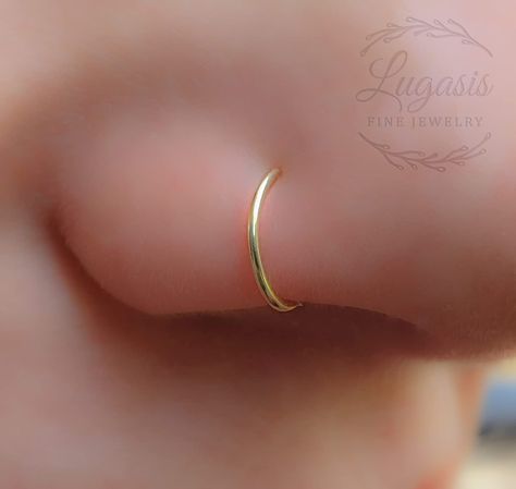 Fake Nose Ring -14K Gold Filled Faux Nose Piercings 14k Gold Filled Fake Nose hoop, No piercing needed Adjustable 7-8mm Hoop diameter #fakenosering #nosering #bohonosering #piercing #pierced #14kgold #gold Nose Piercing Rings, Boho Nose Ring, Nose Piercing Ring, Piercing Rings, Fake Nose Ring, Minimalistic Jewelry, Nose Piercings, Fake Nose Rings, Fake Nose