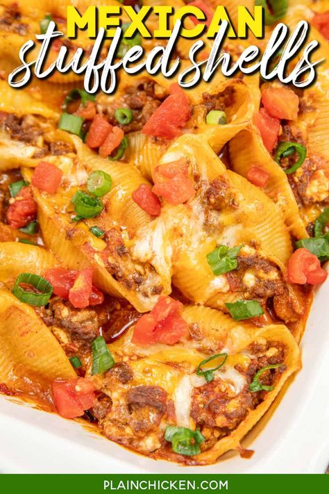 Mexican Stuffed Shells Recipe - comfort food at its best! Pasta shells loaded with seasoned ground beef, cottage cheese, and shredded cheese, all nestled in a tangy enchilada sauce and salsa. These shells are a flavor explosion waiting to happen. Top with sour cream and fresh cilantro for the ultimate fiesta in every bite! Enchilada Shells Stuffed, Taco Stuffed Shells Recipe, Stuffed Shells With Ground Beef, Mexican Chicken Stuffed Shells, Mexican Stuffed Pasta Shells Recipe, Mexican Stuffed Shells With Chicken, Cheesy Taco Stuffed Pasta Shells, Mexican Stuffed Shells, Plain Chicken Recipe