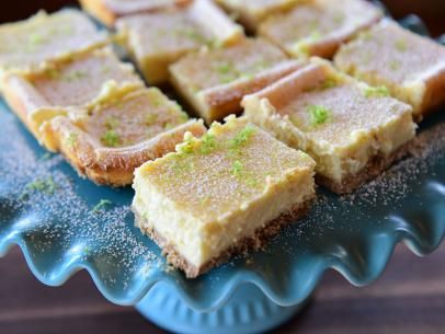 Key Lime Pie Cheesecake Bars Recipe | Ree Drummond | Food Network Lime Cheesecake Bars, Key Lime Cheesecake Bars, Key Lime Pie Cheesecake, Frozen Key Lime Pie, Key Lime Cheesecake, Keylime Pie Recipe, Pie Cheesecake, Cheesecake Bar Recipes, Lime Cheesecake