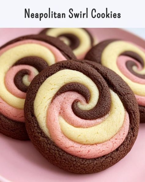 Neapolitan Swirl Cookies These Neapolitan swirl cookies combine chocolate, strawberry, and vanilla in every bite! Fun to make and even better to eat! Ingredients: 2 1/4 cups all-purpose flour 1/2 tsp baking powder 1/4 tsp salt 3/4 cup unsalted butter, softened 3/4 cup granulated sugar 1 large egg 1 tsp vanilla extract 1 tbsp unsweetened cocoa powder 1 tbsp strawberry extract or freeze-dried strawberry powder Pink food coloring (optional) Directions: In a medium bowl, whisk together flour... French Christmas Traditions, Traditional Christmas Cake, Swirl Cookies, Unsweetened Cocoa Powder, Strawberry Powder, Pink Food, Pink Food Coloring, Vanilla Cookies, Chocolate Strawberry