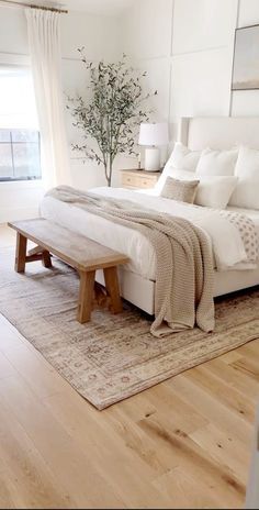 White Bedroom With Tan Accents, Timber Floor Bedroom, Bedroom Hardwood Floor Ideas, Hardwood Floor Bedroom, White Farmhouse Bedroom, Cream And White Bedroom, Hardwood Bedroom Floors, Neutral Bedroom Decor, White Bed Frame