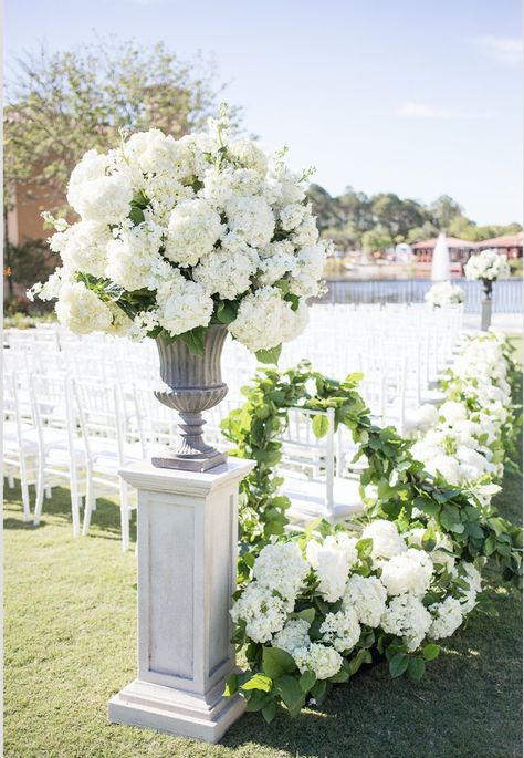 Boho Greenery Wedding Arch, Ground Florals Wedding Aisle, Ceremony Vase Arrangements, Timeless Wedding Floral Arrangements, Large White Centerpiece Wedding, Urn Floral Arrangements Wedding, Wedding Ceremony Urns, Wedding Flowers In Urn, Hydrangea Altar Arrangement