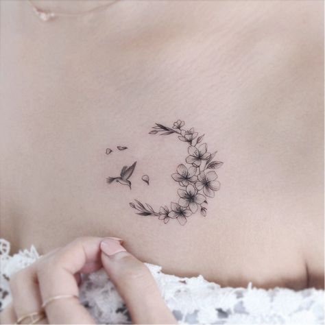 Cherry blossom tattoo by Tattooist Greem #TattooistGreem #cherryblossomtattoos #cherryblossom #flowers #floral #nature #plant #cherryblossomtattoo #illustrative #linework #fineline #hummingbird #chesttattoo #small | Sep 19th 2019 | 1180281 Foot Tattoos For Women, Tattoos For Women Flowers, Moon Tattoo Designs, Tiny Tattoo, Blossom Tattoo, Cherry Blossom Tattoo, Hummingbird Tattoo, Shoulder Tattoos For Women, Collar Bone Tattoo